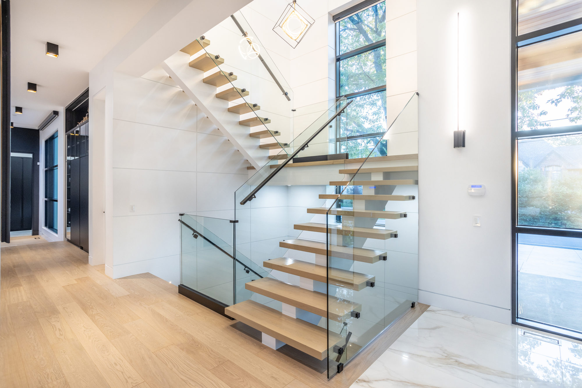 Residents are first greeted by the stunning staircase. 