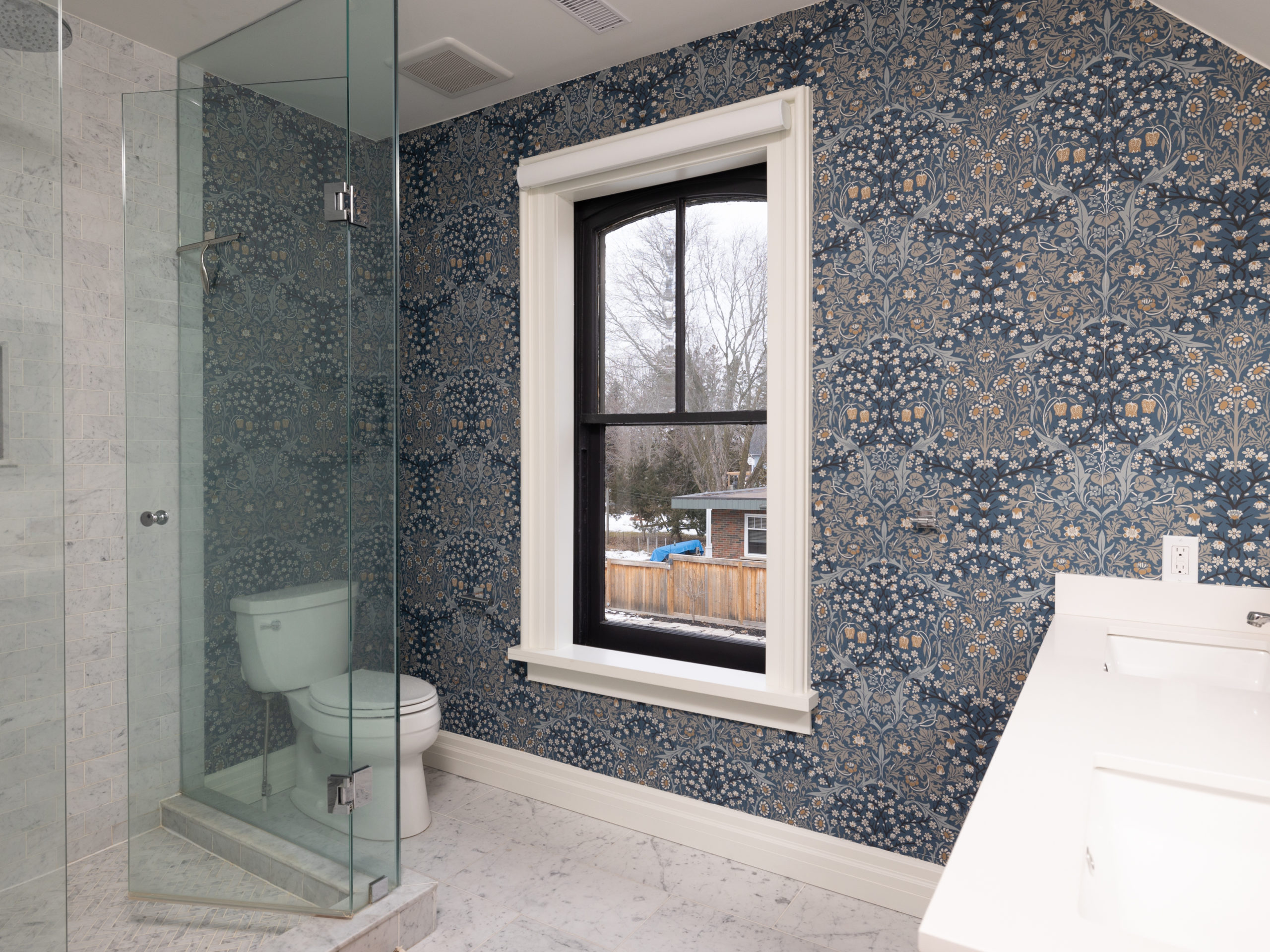 In the ensuite: a glass shower and double vanity. 