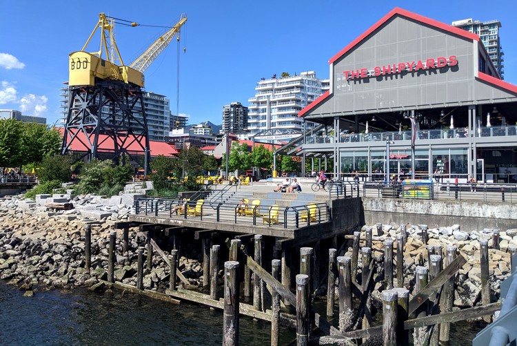 The Shipyards yellow crane and pier in North Vancouver British Columbia