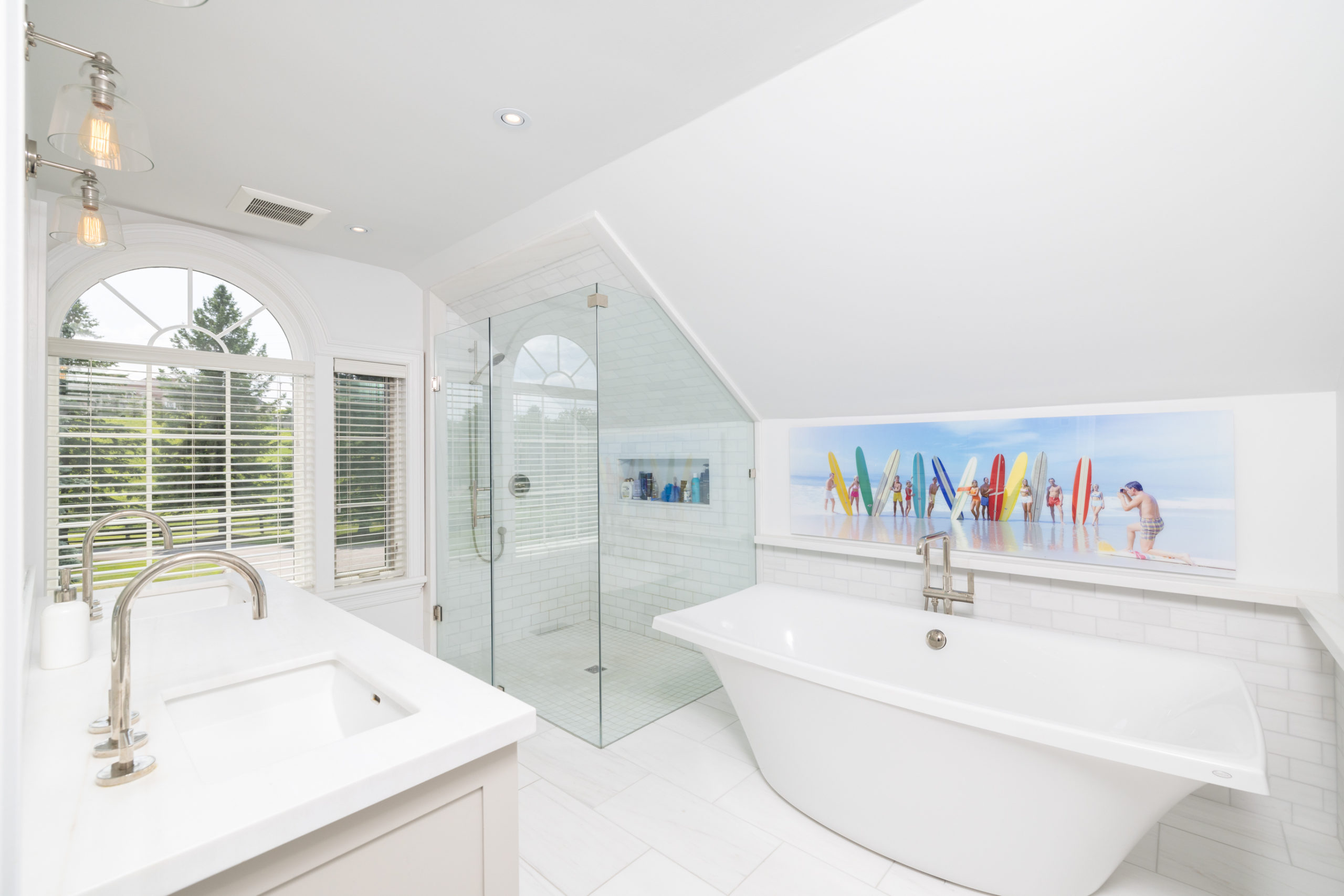 In the main ensuite: a soaker tub, a glass shower and plenty of marble.