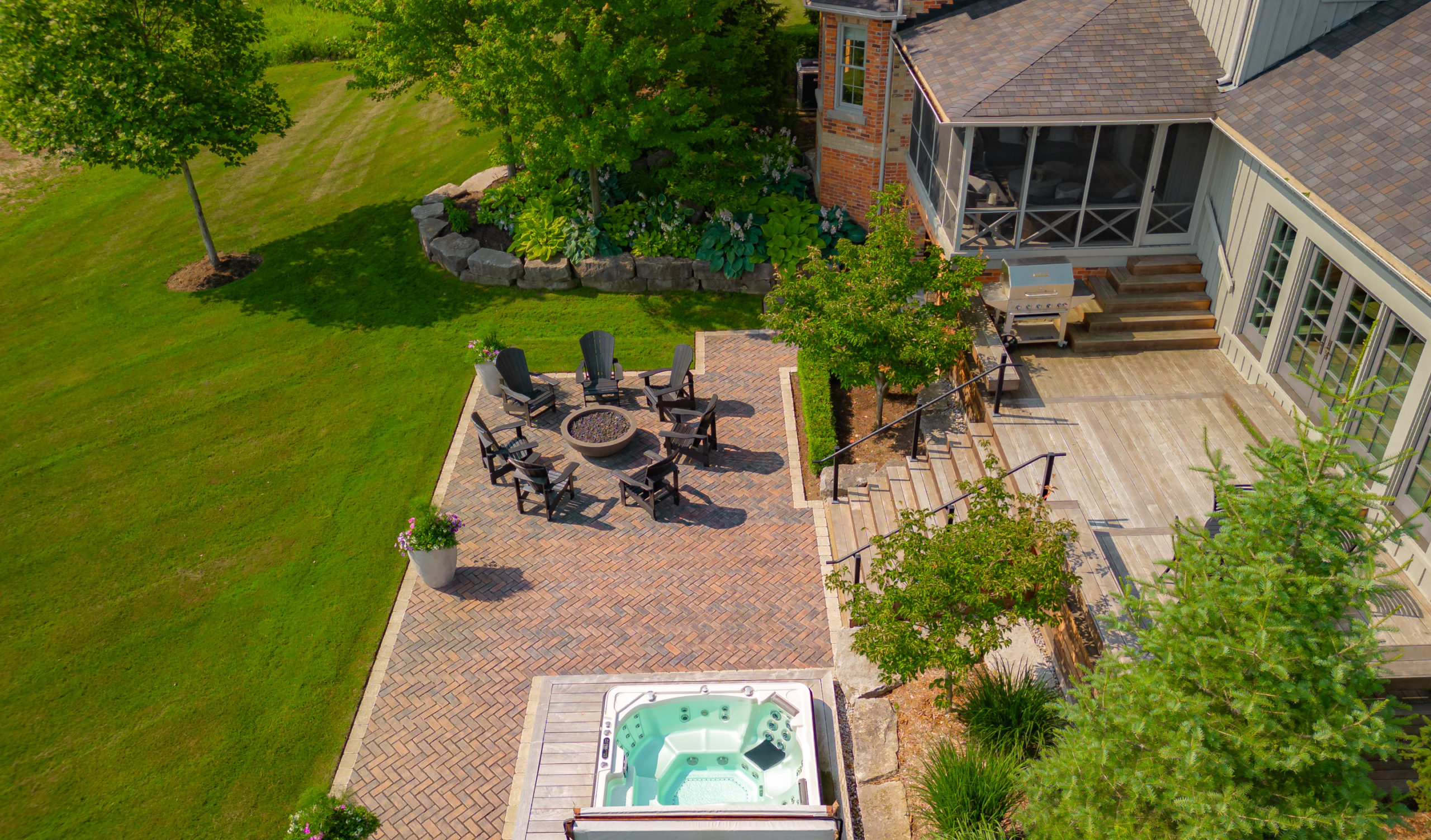 A bird's eye view of the fire pit and hot tub. 