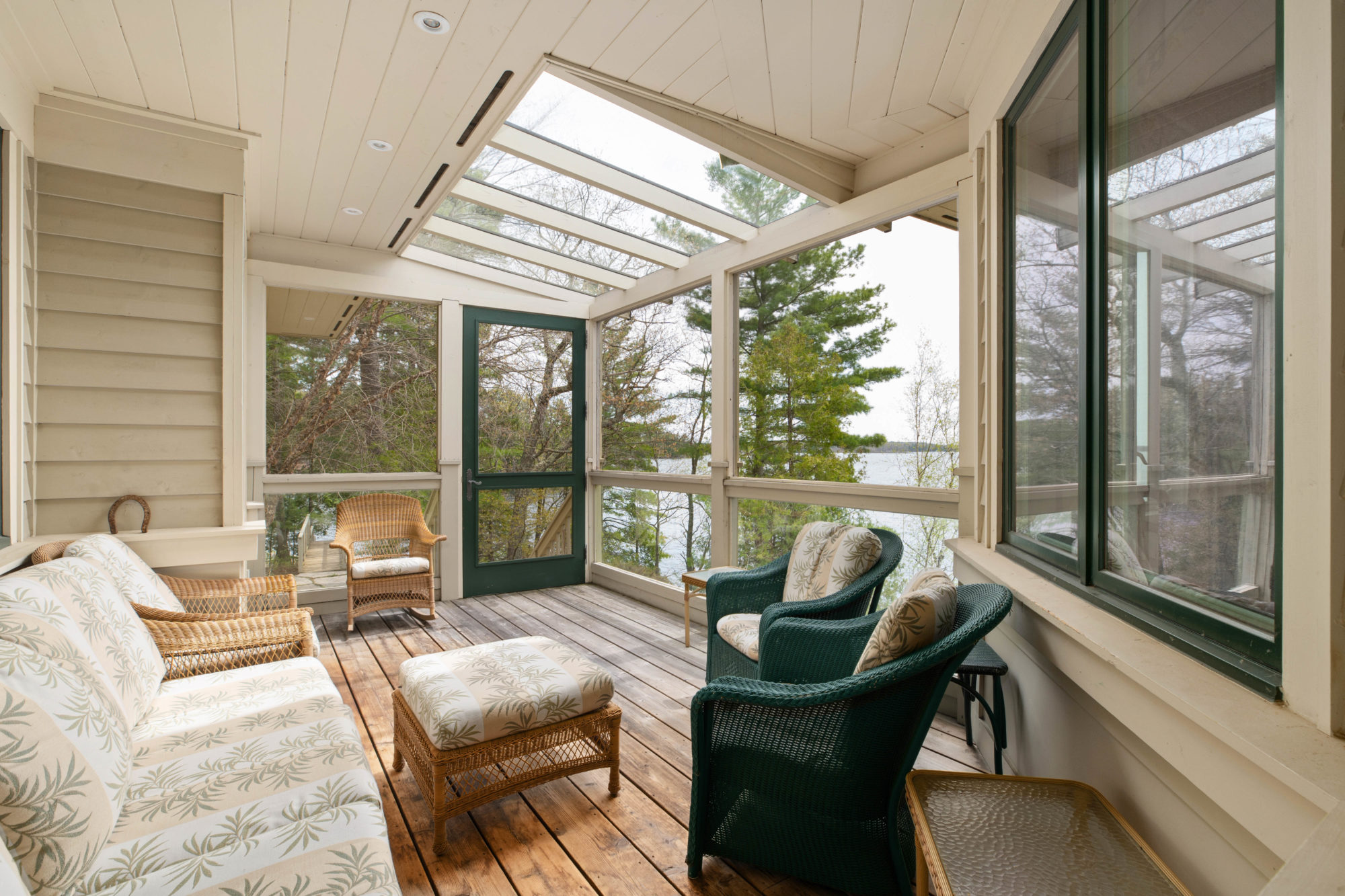 The screened-in porch is ideal for reading or a morning coffee.