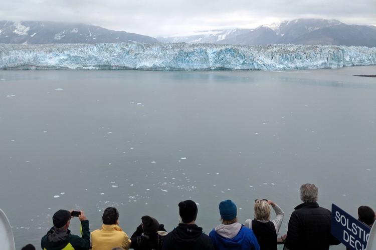 Guest viewing the Hubbard Glacier in Alaska on Celebrity Eclipse Alaska Cruise