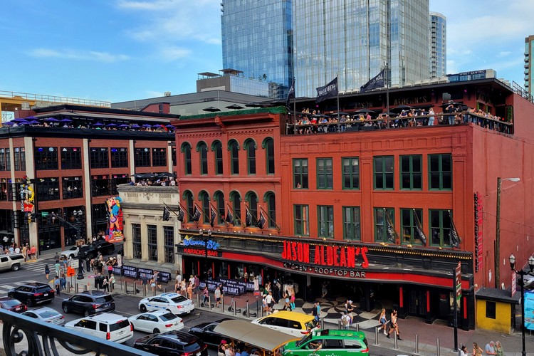 View of Jason Aldean's Kitchen and Rooftop Bar on Broadway Street in Nashville Tennessee 