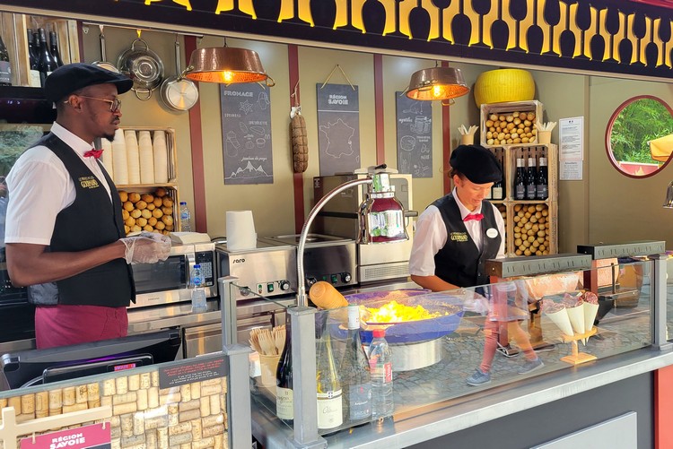 Vendors selling French cuisine at Remy's Ratatouille Adventure in Disneyland Park at Disneyland Paris