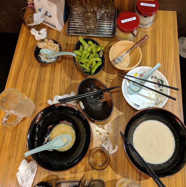 photo of empty bowls of Japanese food at Tokyo restaurant