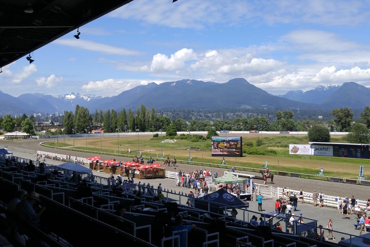 Hasting Park racecourse in East Vancouver, view of the track and North Shore mountains