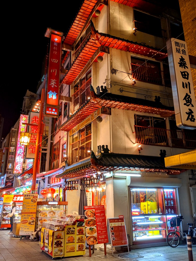 Kobe Chinatown buildings at night. Traditional Chinese Architecture in Kobe. night street photograph