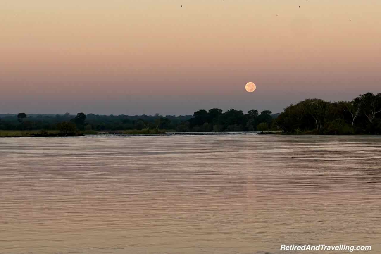 Zambezi River Sunrise Moon Setting - Safari Lodge Stay In Zambia At Thorntree River Lodge