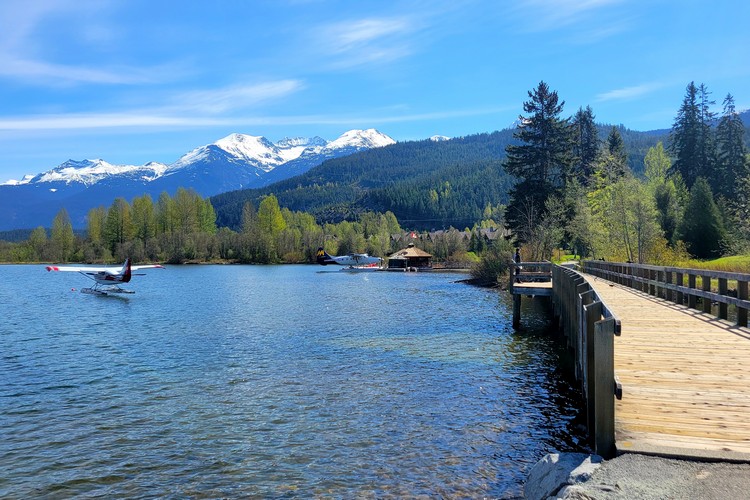 View of the wooden bridge and float planes at Green Lake