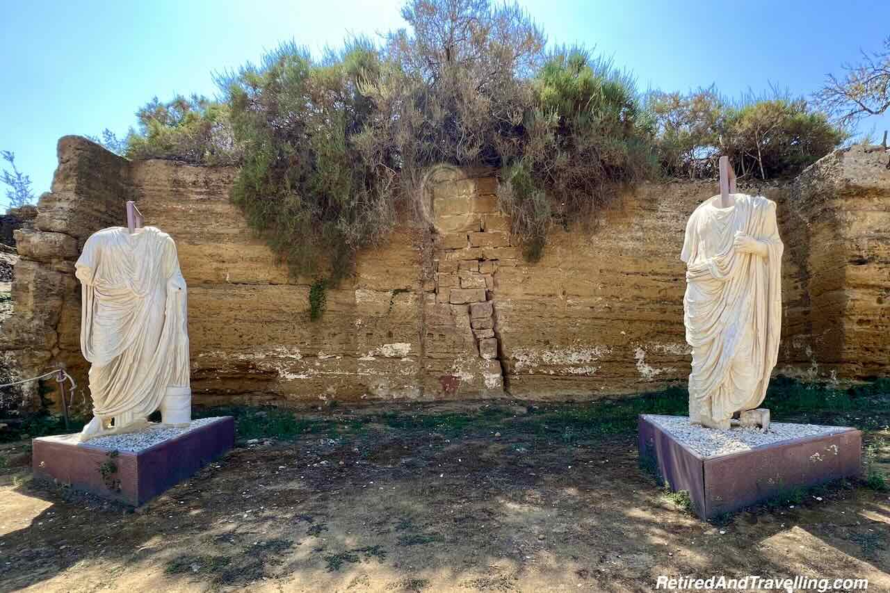 Roman Temple Wall Headless Statues - Explore The Valley Of Temples In Agrigento Sicily